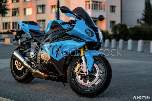 Picture of Sports motorcycle on the road at sunset